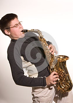 Boy with Saxophone photo