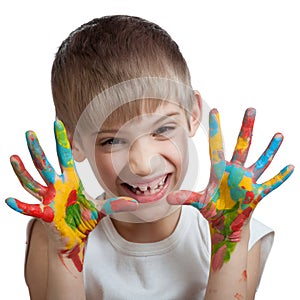 Boy scares their hands stained with paint