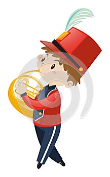 Boy in school band playing french horn