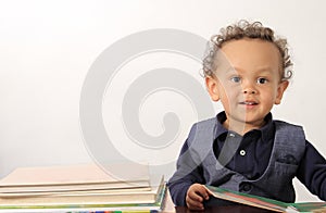 Boy with school book going back to school stock photo