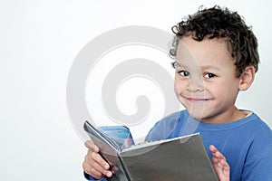 Boy with school book going back to school stock photo