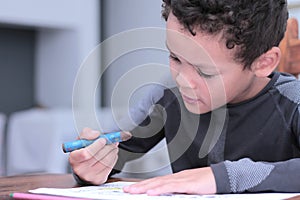 Boy with school book going back to school stock photo