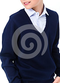 Boy in school uniform on white background.