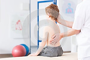 Boy with scoliosis during rehabilitation