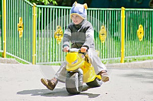 The boy on the scooter