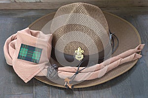 Boy scout equipment on wooden background