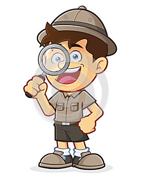 Boy Scout or Explorer Boy with Magnifying Glass photo