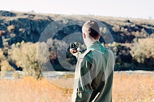 Boy Scout Holding a Compass to Find Direction