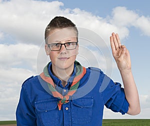 Boy scout making an oath swear