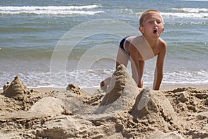 Boy screaming at sea