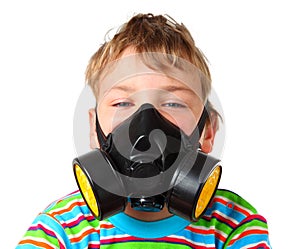 Boy up ones eyes in black respirator photo