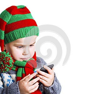 Boy sends a text message with a Christmas wish to Santa