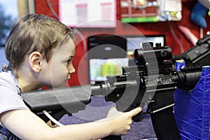 Boy at shooting range