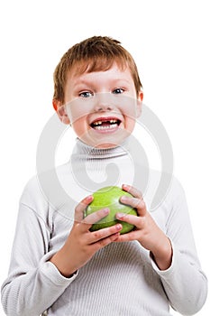 Boy showing his missing milk teeth