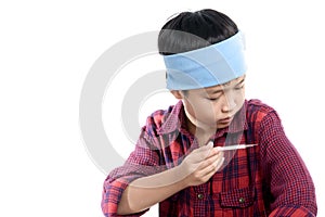 Boy sick use termometer photo