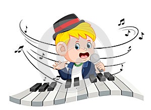 Boy singing and playing piano