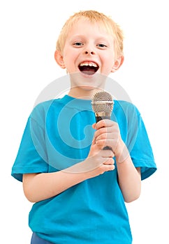 The boy sings with a microphone