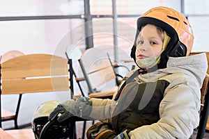 Boy sitting in cafe