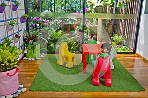 Boy sitting eco friendly living room nature