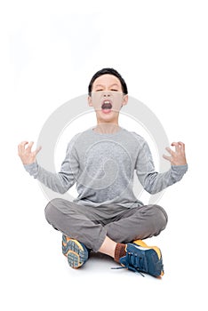 Boy sitting and scream over white