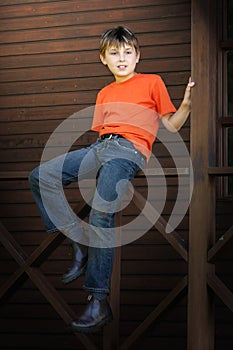 Boy sitting on the verandah