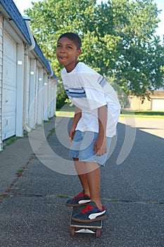 Boy On Skate Board