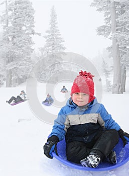 Boy sledding