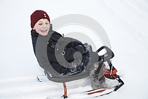 A boy on the sledge