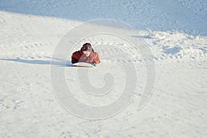 Boy sledging