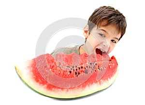 A boy and slice of watermelon