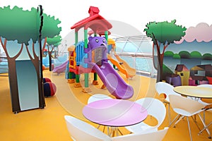 Boy slide on children's playground