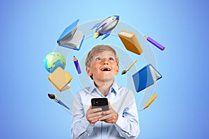 Boy with smartphone and school icons