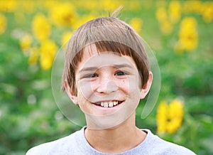 Boy Smiling in a Flower Field