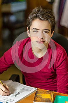 Boy smiling on homeworks