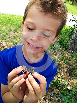 Boy with snails