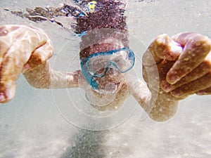 Boy snorkeller underwater