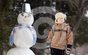 Boy and snowman