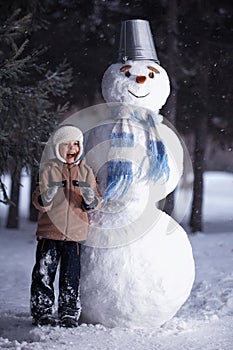 Boy and snowman