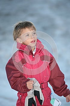 Boy in snowsuit