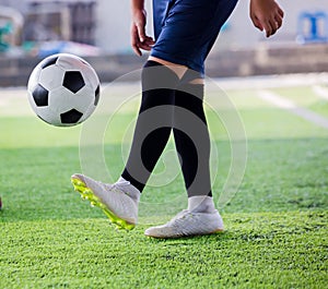 Boy soccer juggling and control soccer ball