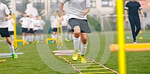 Boy Soccer Player In Training. Young Soccer Players at Practice Session photo