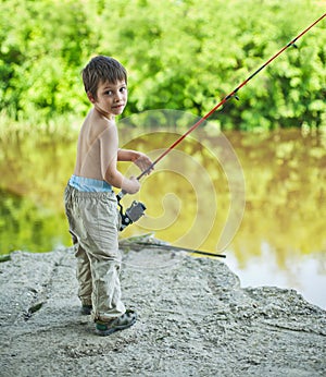 Boy with spinning rod