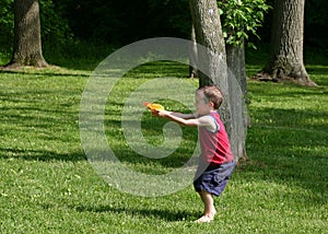 Boy Squirting Squirt Guns photo