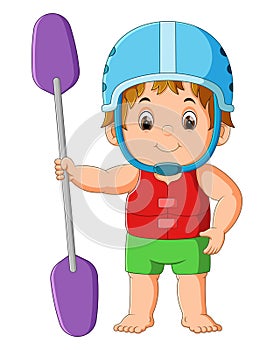 The boy is standing with the safety lifebuoy and holding the paddle