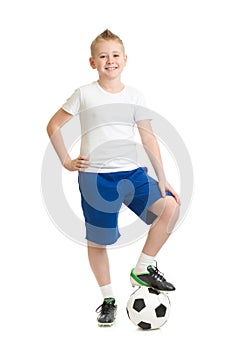 Boy standing with soccer ball isolated