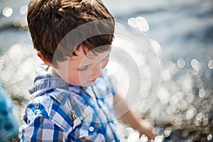 Boy standing in the water