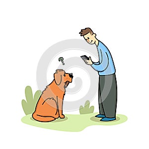 Boy stares into a gadget on a walk with a dog. Dog puzzled by the owner with a phone. Gadget addiction, social media