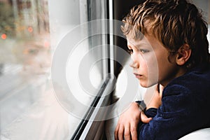 Boy stays home bored by school closings due to covid pandemic