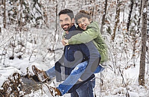boy and Stepfather on forest in winter season