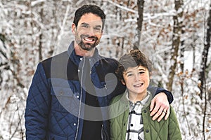 boy and Stepfather on forest in winter season